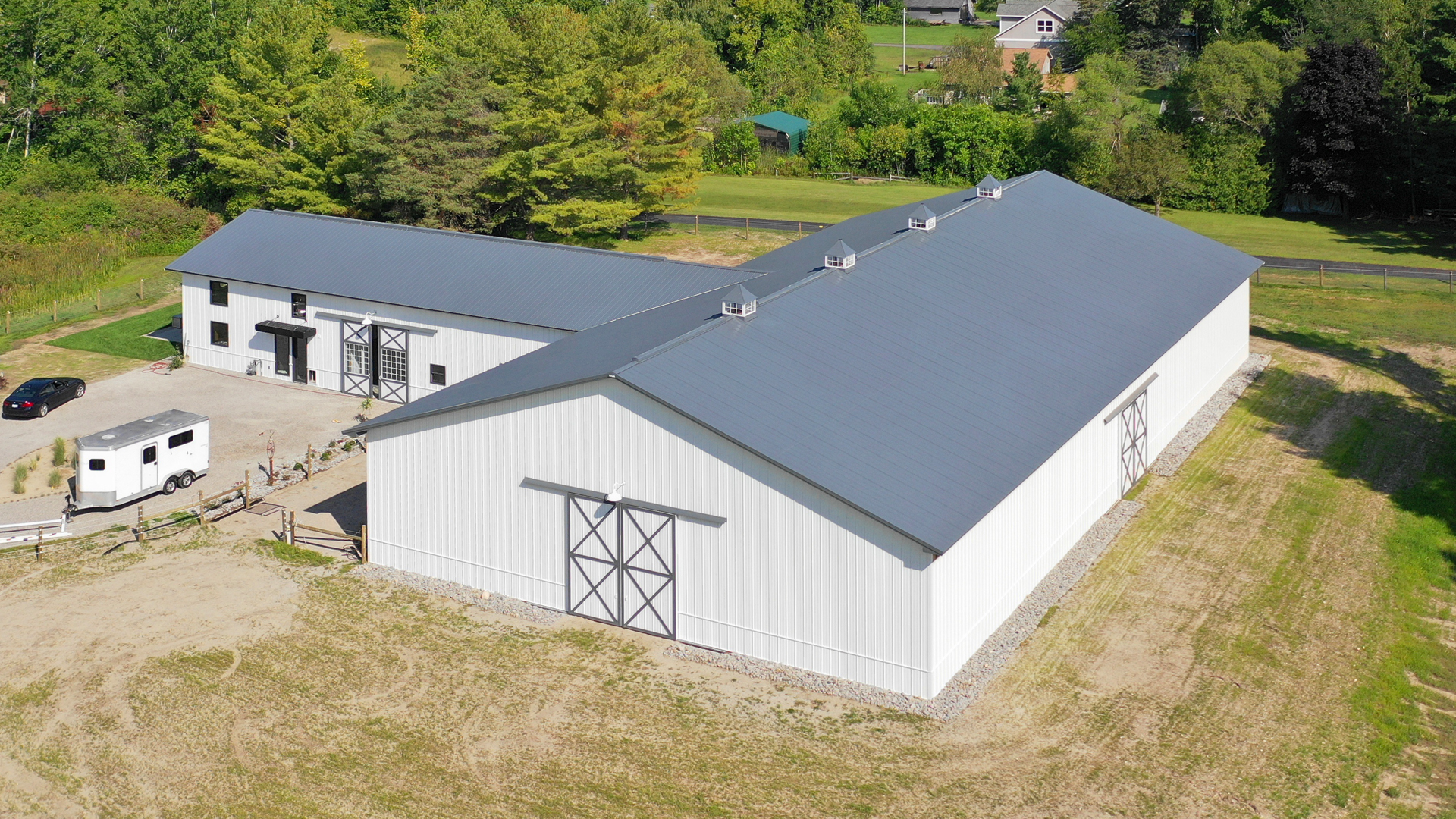 Residential Pole Barn Home with Horse Stables and Riding Arena